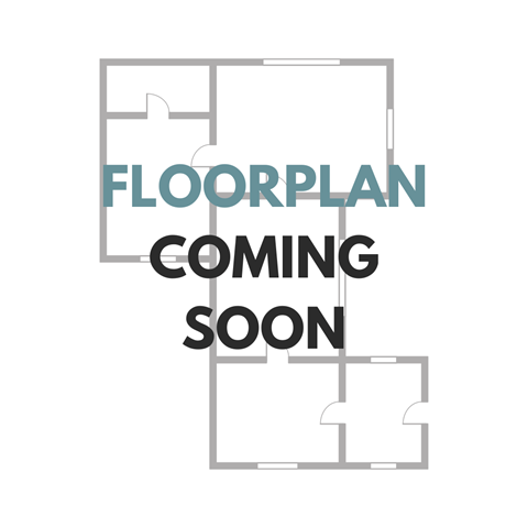 a room with a bed and a desk